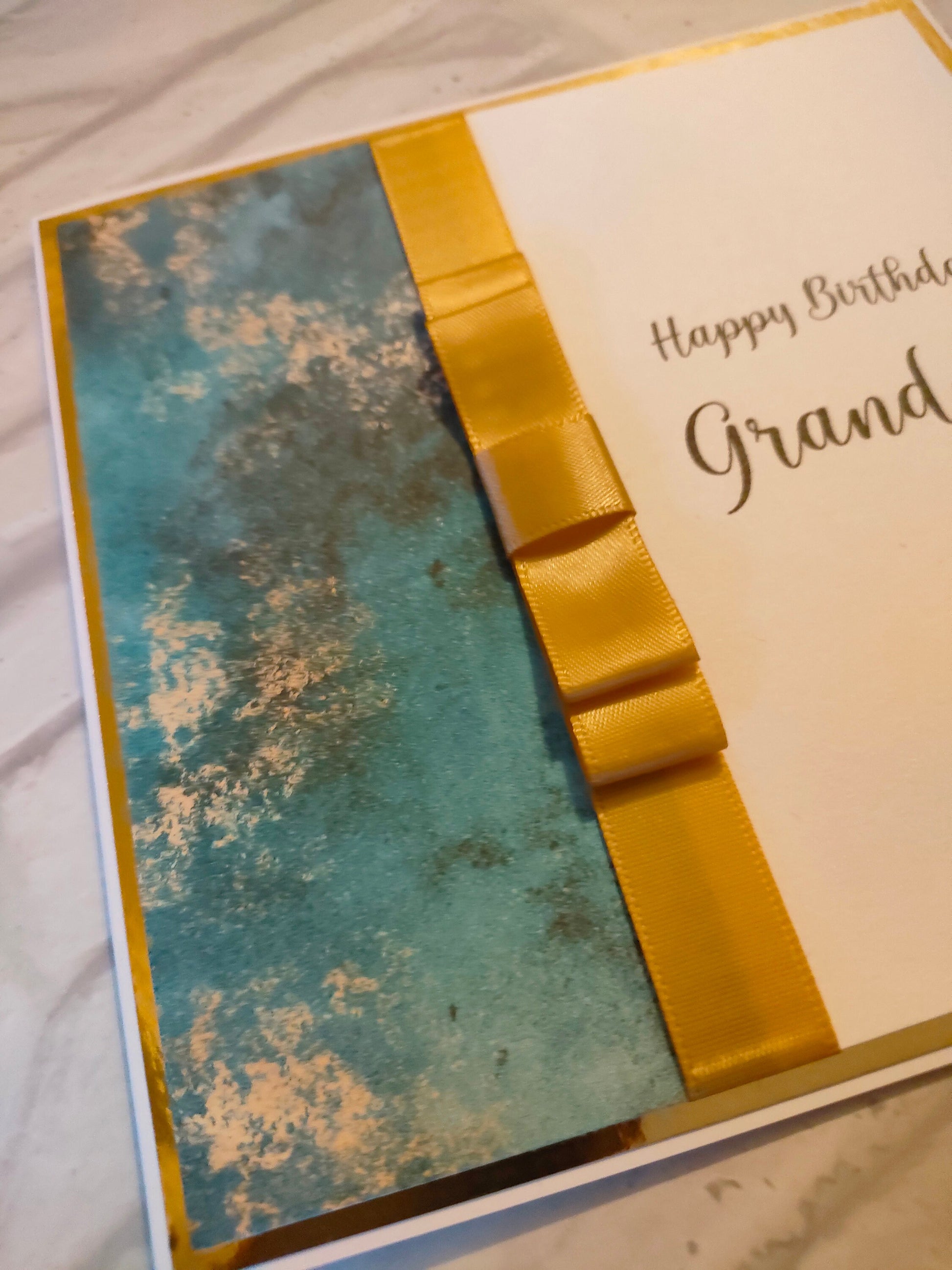 Teal & Gold Card - Bluesky's creation