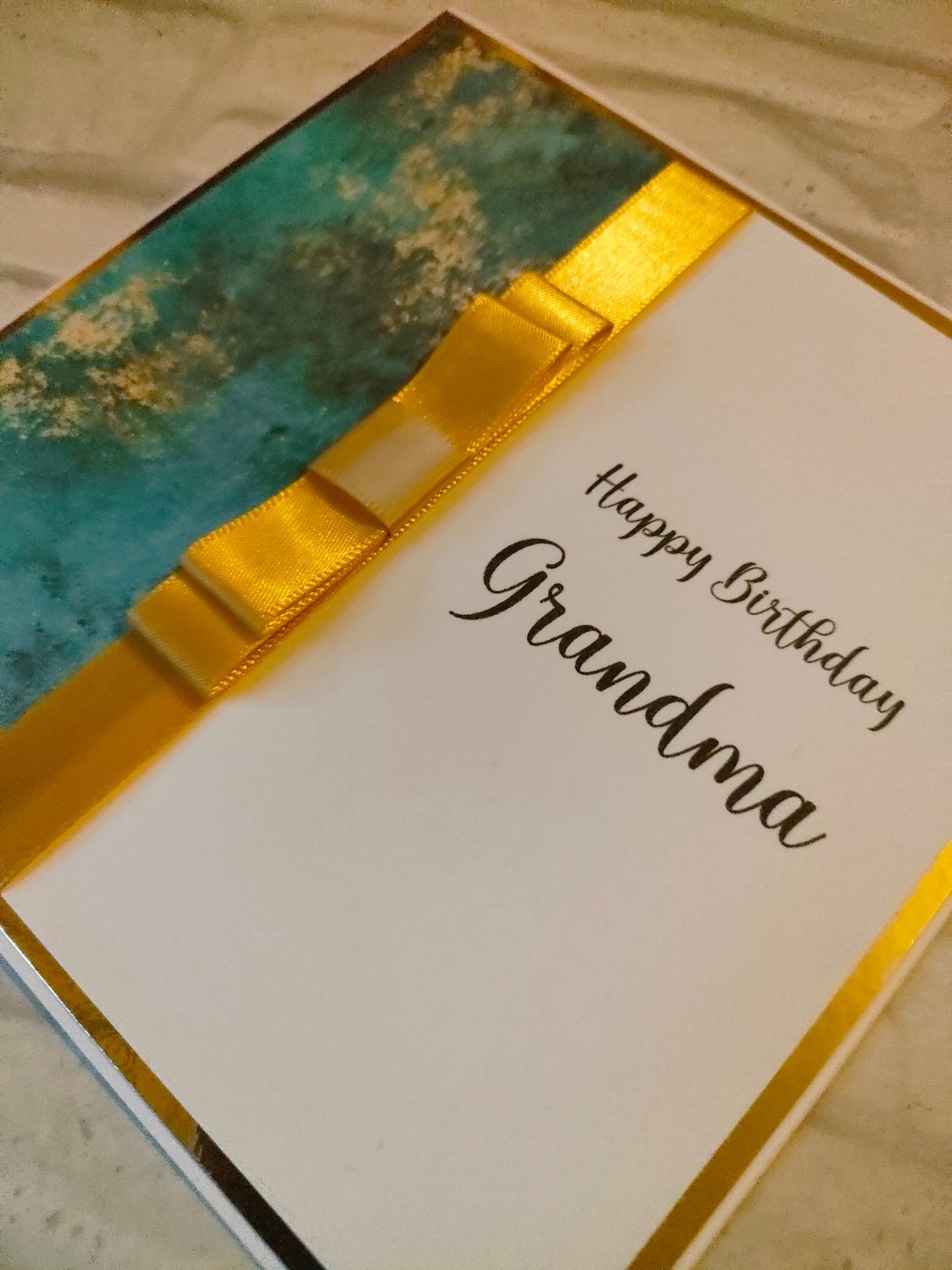 Teal & Gold Card - Bluesky's creation