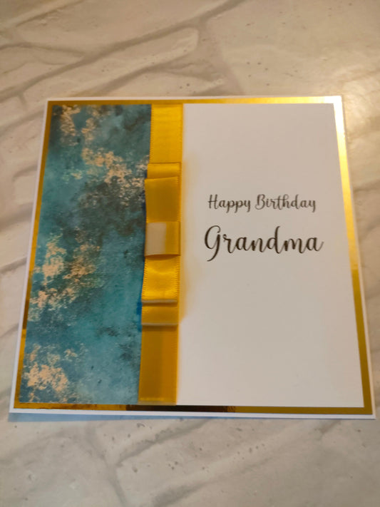 Teal & Gold Card - Bluesky's creation